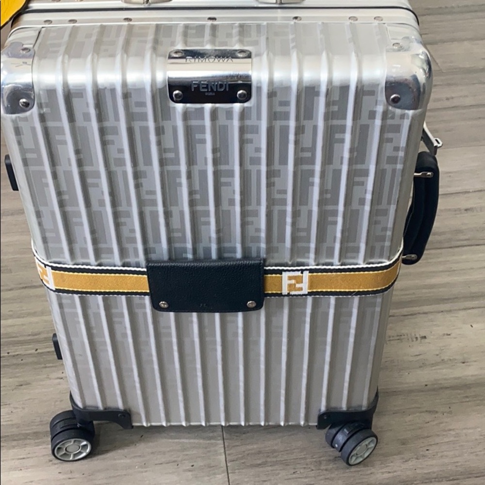 Yellow Fendi rimowa bag
